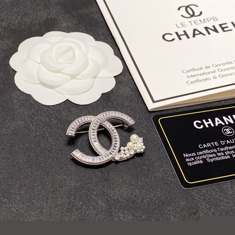 Ch*el brooches